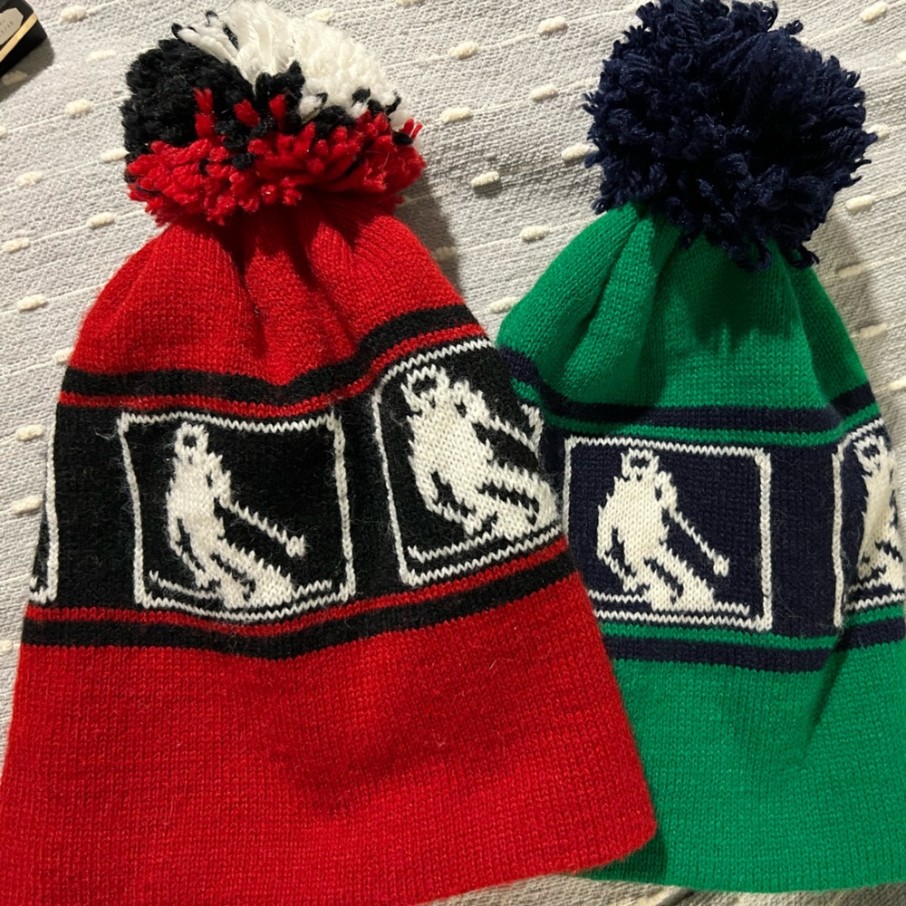 Toboggans, vintage snow skier hats with Pom poms.
